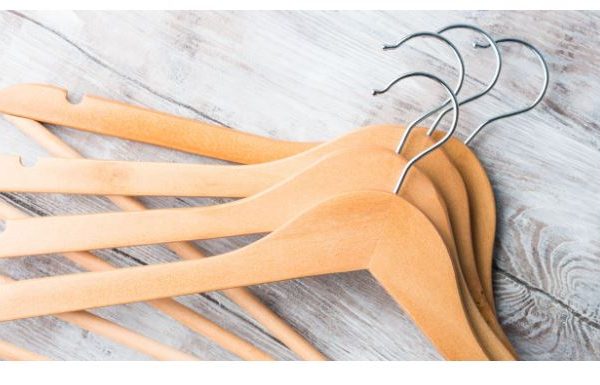 The Practicality of Wooden Hangers in Bulk in Hospitality Business